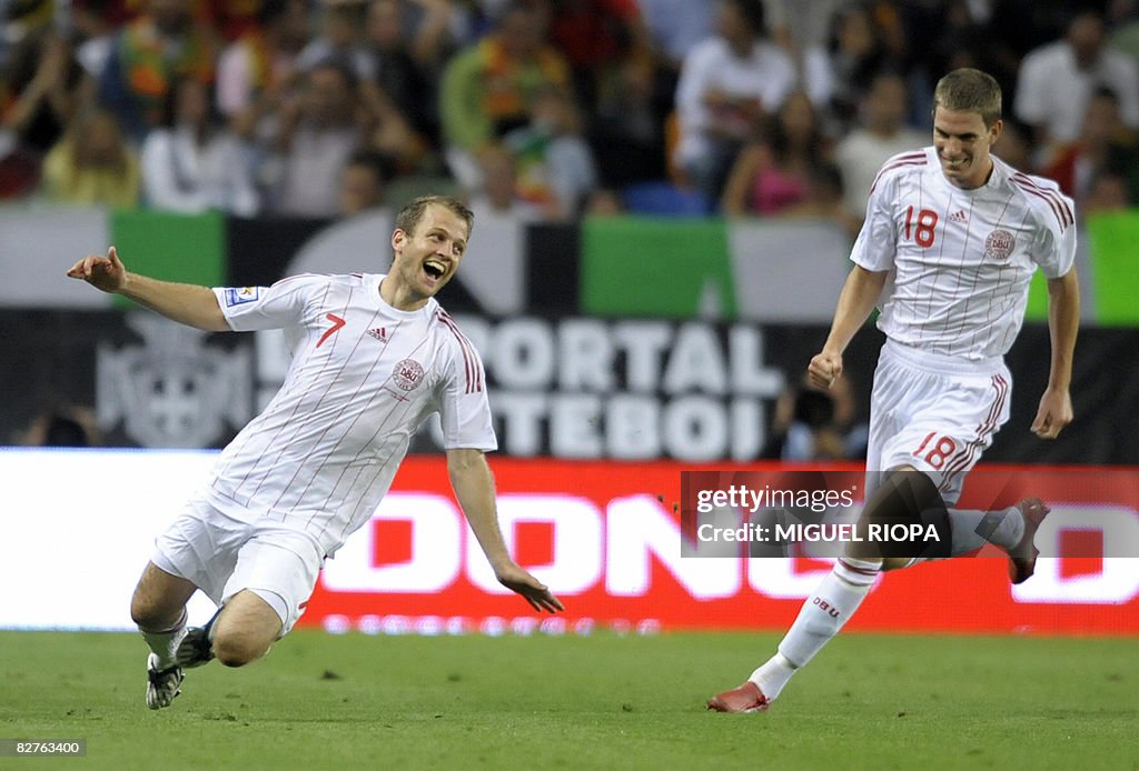 Denmark's Daniel Jensen (L) celebrates n