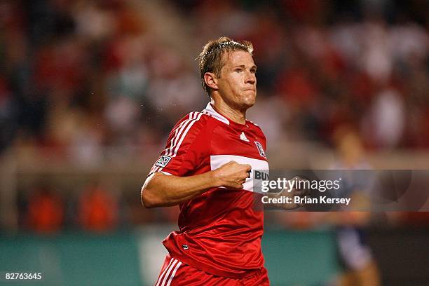 Brian McBride of the Chicago Fire runs up the field against the New York Red Bulls during the second half at Toyota Park on September 6, 2008 in...