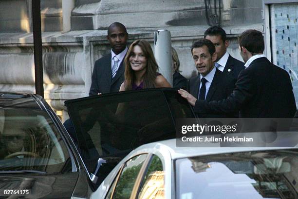 French President Nicolas Sarkozy and Carla Bruni-Sarkozy leave Jean Sarkozy's wedding at Town Hall on September 10, 2008 in Neuilly, France.