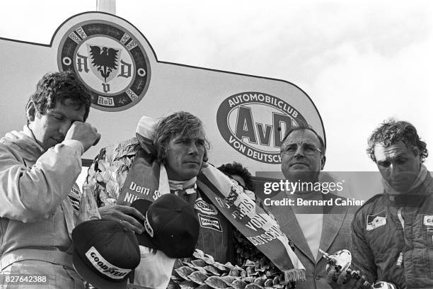 Jody Scheckter, James Hunt, Jochen Mass, Grand Prix of Germany, Nurburgring, 01 August 1976. Somber mood on the podium for James Hunt, Jody Scheckter...