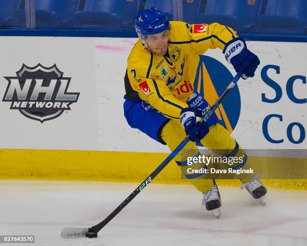 Timothy Liljegren of Sweden passes the puck against USA during a World Jr. Summer Showcase game at USA Hockey Arena on August 2, 2017 in Plymouth,...