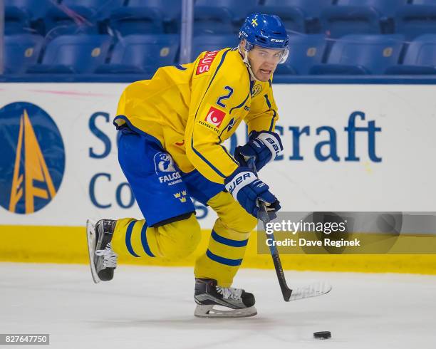 Timothy Liljegren of Sweden skates up ice with the puck against USA during a World Jr. Summer Showcase game at USA Hockey Arena on August 2, 2017 in...