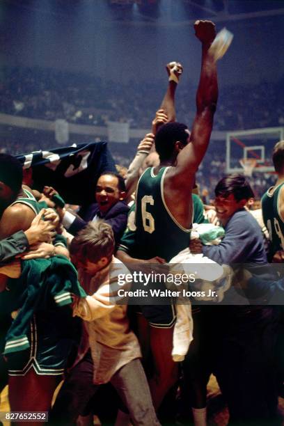 Bill Russell of the Boston Celtics celebrates after winning Game 6 of the NBA Finals against the Los Angeles Lakers at The Forum in Inglewood,...