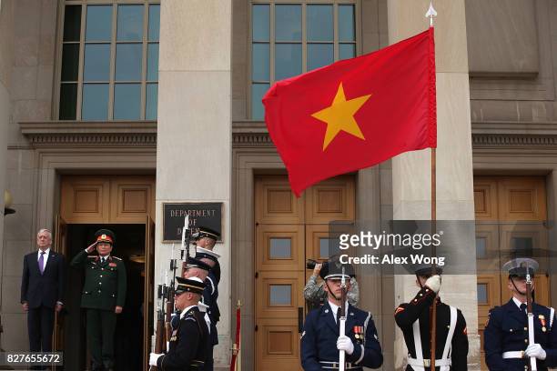 Secretary of Defense Jim Mattis participates in an enhanced honor cordon to welcome Vietnamese Minister of National defense General Ngo Xuan Lich at...