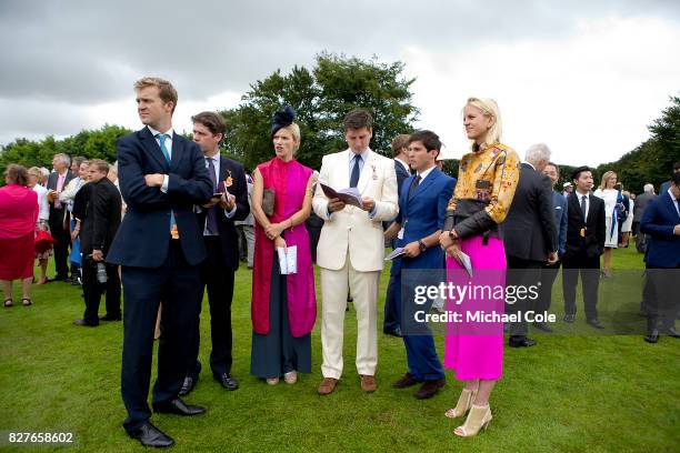 Group of racegoers in the Paddock, 'Ladies Day' at "Glorious Goodwood" - The Qatar Goodwood Festival at Goodwood Racecourse, August 3, 2017 in...