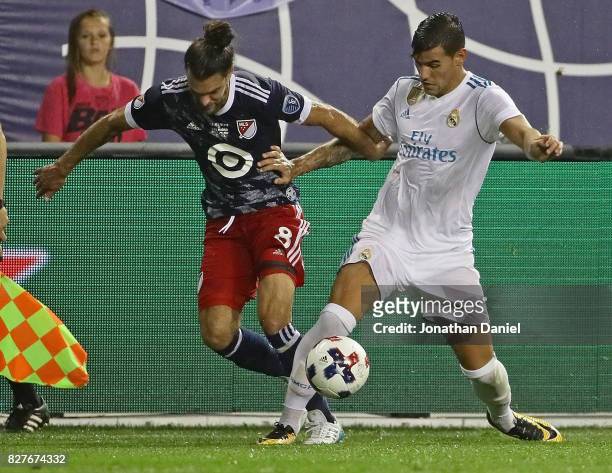 Graham Zusi of the MLS All-Stars battles for the ball with Theo Hernandez of Real Madrid during the 2017 MLS All- Star Game at Soldier Field on...