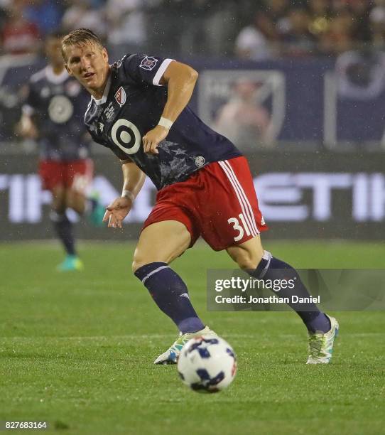 Bastian Schweinsteiger of the MLS All-Stars passes against Real Madrid during the 2017 MLS All- Star Game at Soldier Field on August 2, 2017 in...