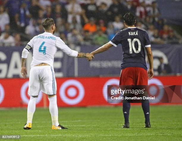 Sergio Ramos of Real Madrid and Kaka of the MLS All-Stars shake hands after a colision during the 2017 MLS All- Star Game at Soldier Field on August...