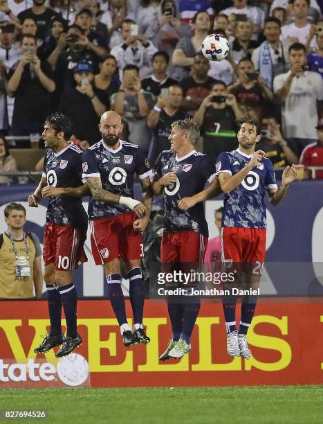 Kaka, Jelle Van Damme; Bastian Schweinsteiger and Ignacio Piatti leap to try and block a free kick against Real Madrid during the 2017 MLS All- Star...