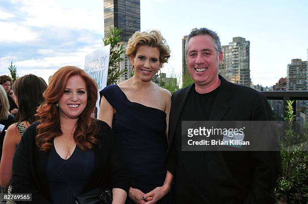 Jennifer Koppelman Hutt, Alexis Stewart and Brian Koppelman attend the launch party for "Whatever Martha" at the Empire Hotel Roof Deck on September...