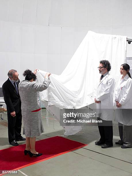 scientists unveil invention to dignitaries - launch party inside stock pictures, royalty-free photos & images
