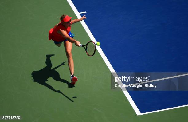 Donna Vekic of Croatia plays a shot against Eugenie Bouchard of Canada during Day 4 of the Rogers Cup at Aviva Centre on August 8, 2017 in Toronto,...