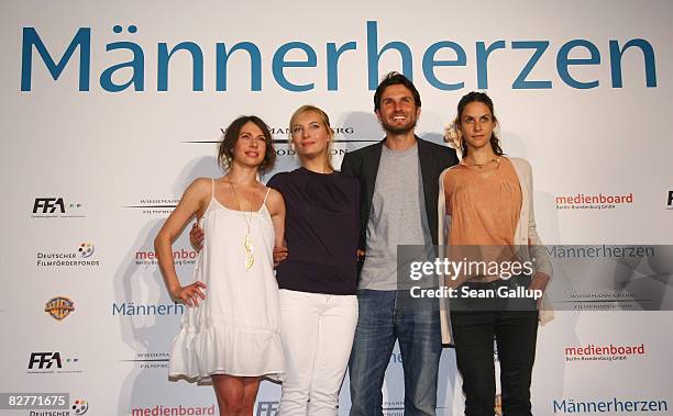 Actress Jana Pallaske, actress Nadja Uhl, director Simon Verhoeven and actress Liane Forestieri attend the photocall for "Maennerherzen" on September...