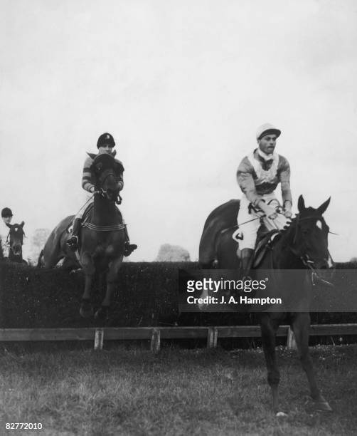 Martim M leads Monaveen over the second jump at Fontwell Park Racecourse, West Sussex, to win the Chichester Handicap Steeplechase, 10th October...