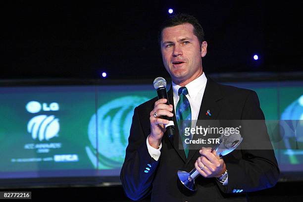 Simon Taufel of Australia poses with his award at The International Cricket Council Awards in Dubai on September 10, 2008. Taufel was named as the...