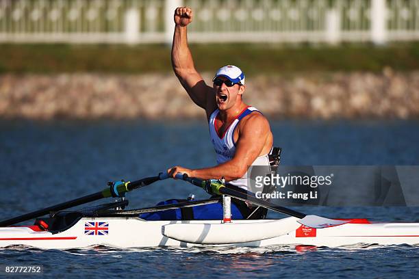 Tom Aggar of Great Britain celebrates after winning the Rowing Men's Single Sculls Final at Shunyi Olympic Rowing-Canoeing Park during day five of...
