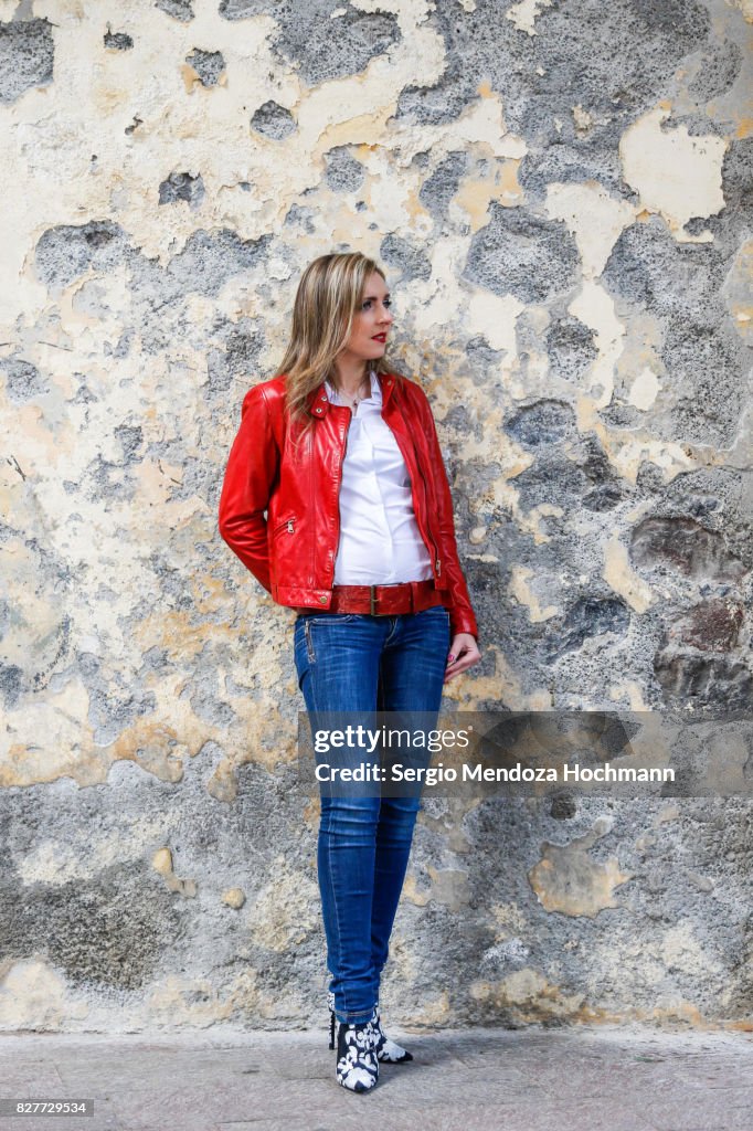 A beautiful blonde woman looking stylish in front of a grungy wall - Mexico City, Mexico