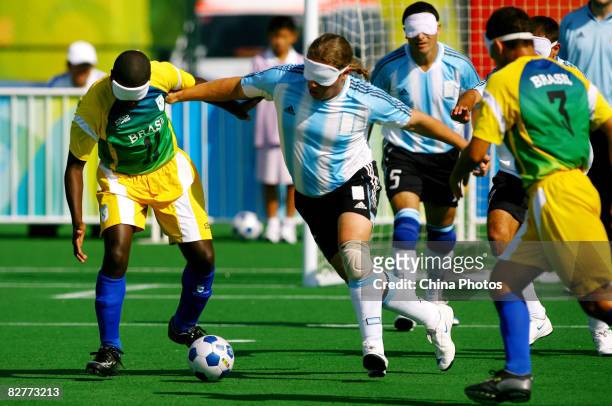 Diego Cerega of Argentina competes in the Five-A-Side Football match between Argentina and Brazil at Olympic Green Hockey Field B during day five of...
