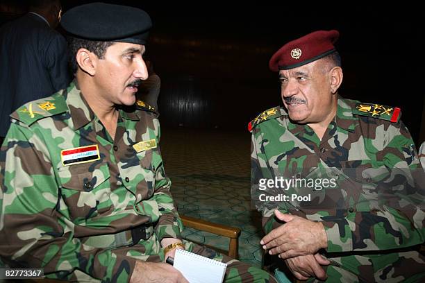 Iraqi Major General Qassim Atta , spokesman for the Baghdad operations dubbed ?Fardh al Qanoon? or ?Enforcement of the Law?, speaks with Abud Qambar,...
