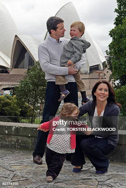 Crown Prince Frederik and Crown Princess Mary of Denmark relax with their children, Prince Christian , age two, and Princess Isabella , age one, in...