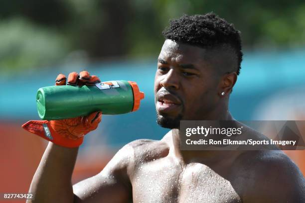 Cameron Wake of the Miami Dolphins looks on during training camp on August 8, 2017 at the Miami Dolphins training facility in Davie, Florida.