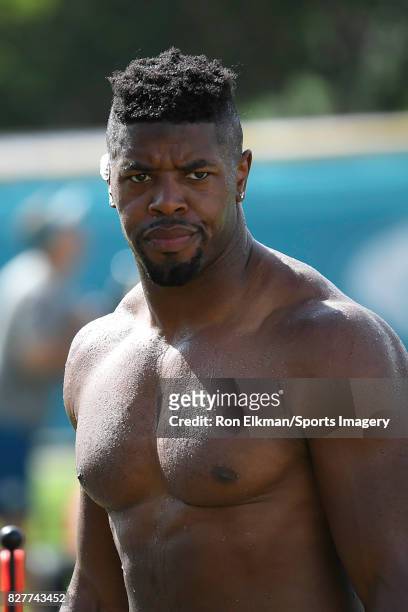 Cameron Wake of the Miami Dolphins looks on during training camp on August 8, 2017 at the Miami Dolphins training facility in Davie, Florida.