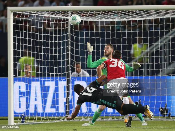 Casemiro of Real Madrid heads the ball against the bar during the UEFA Super Cup match between Real Madrid and Manchester United at Philip II Arena...