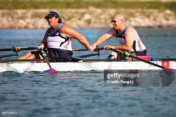 Scott Brown and Angela Madsen of USA celebrate after winning the Rowing Mixed Double Sculls - TA Fina B at Shunyi Olympic Rowing-Canoeing Park during...