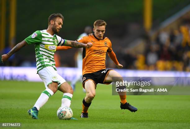 James Bailey of Yeovil Town and Connor Ronan of Wolverhampton Wanderers during the Carabao Cup First Round match between Wolverhampton Wanderers and...