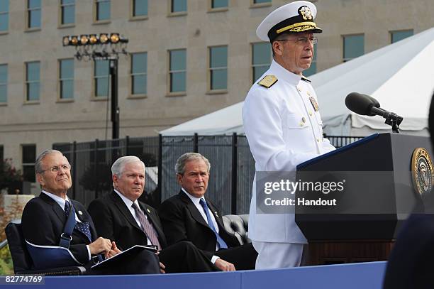 In this handout from the U.S. Department of Defence , Chairman of the Joint Chiefs of Staff Navy Adm. Mike Mullen speaks as former U.S. Secretary of...