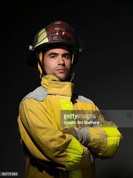close-up ritratto di pompiere - firefighters foto e immagini stock