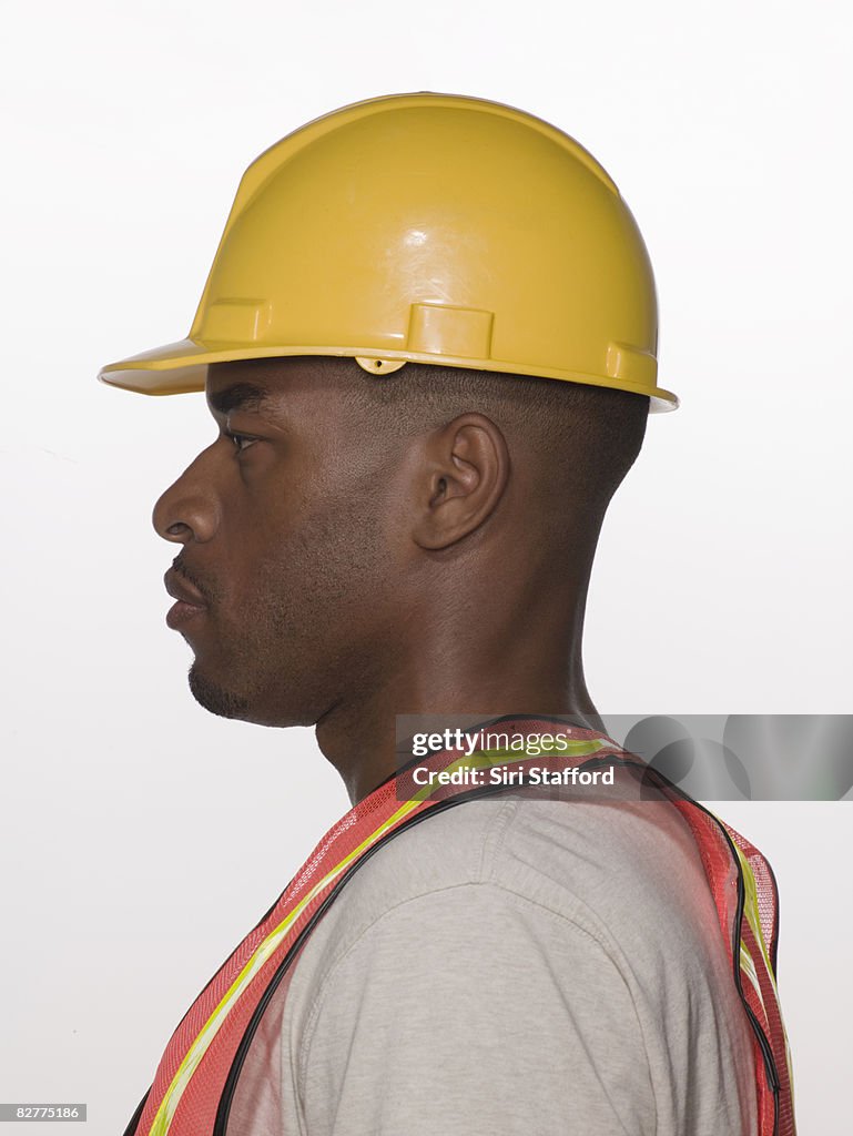 Man wearing hard-had and safety vest