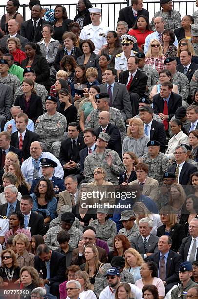 In this handout image provided by the U.S. Department of Defense, people listen during the Pentagon Memorial dedication ceremony on the seventh...