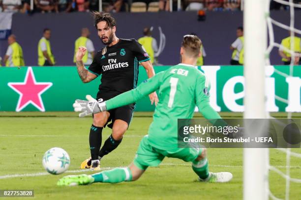 Isco of Real Madrid scores his sides second goal past David De Gea of Manchester United during the UEFA Super Cup final between Real Madrid and...