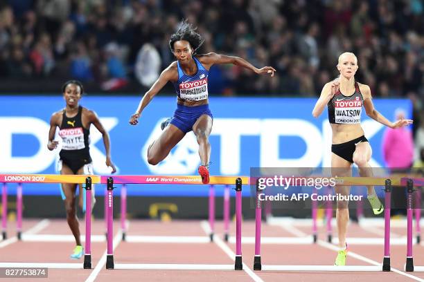 Jamaica's Rhonda Whyte, US athlete Dalilah Muhammad and Canada's Sage Watson compete in a semi-final of the women's 400m hurdles athletics event at...