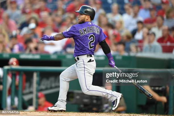 Alexi Amarista of the Colorado Rockies takes a swing during game two of a doubleheader baseball game against the Washington Nationals at Nationals...