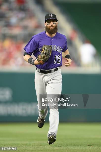 Charlie Blackmon of the Colorado Rockies runs back to the dug out during game two of a doubleheader baseball game against the Washington Nationals at...