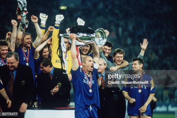 Juventus captain Gianluca Vialli holds the cup aloft after his team beat AFC Ajax to win the UEFA Champions League Final at the Stadio Olimpico,...