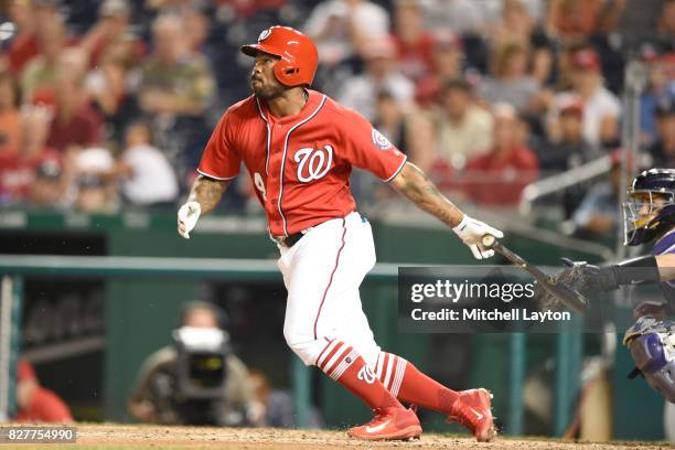 Howie Kendrick of the Washington Nationals takes a swing during game two of a doubleheader baseball game against the Colorado Rockies at Nationals...