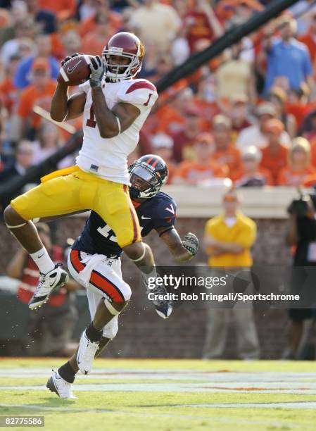 Patrick Turner of the Southern California Trojans makes a catch for a touchdown in the third quarter against the Virginia Cavaliers during the game...