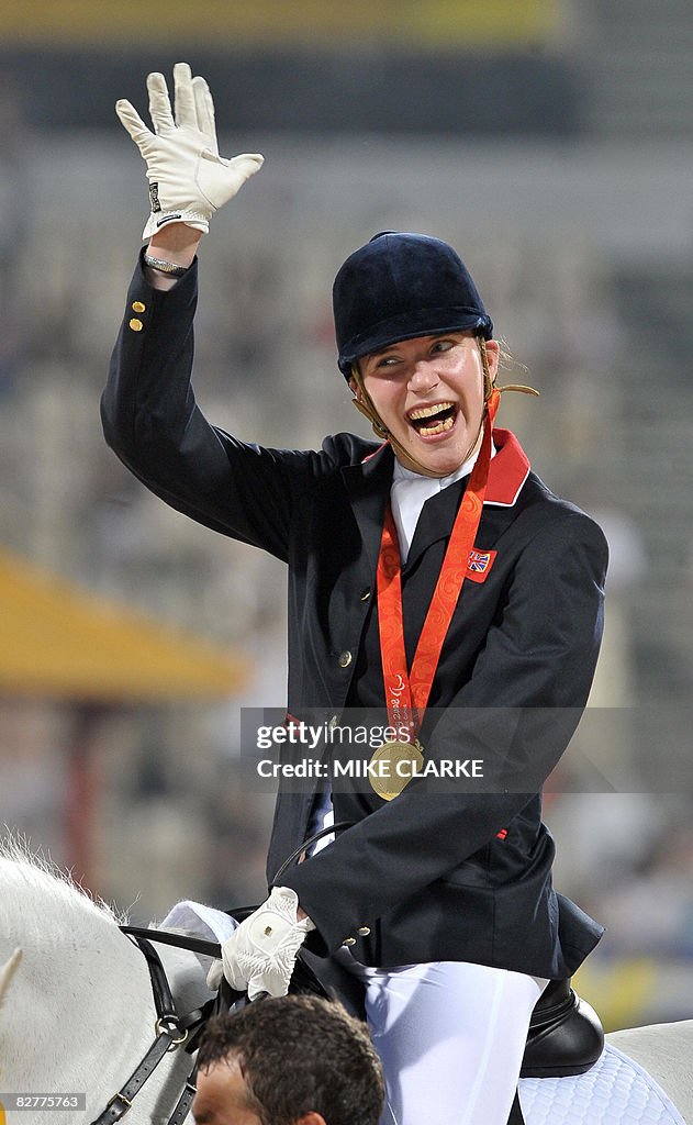 Britain's Sophie Christiansen waves afte