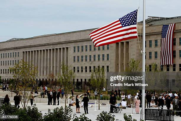 People visit the new Pentagon Memorial following a dedication ceremony on the seventh anniversary of the 9-11 terrorist attacks September 11, 2008 in...