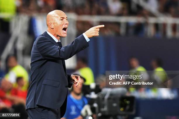 Real Madrid's French coach Zinedine Zidane gives his instructions during the UEFA Super Cup football match between Real Madrid and Manchester United...