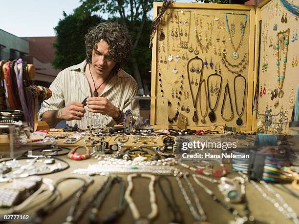 a craftsperson on the street - jewelry maker stock pictures, royalty-free photos & images