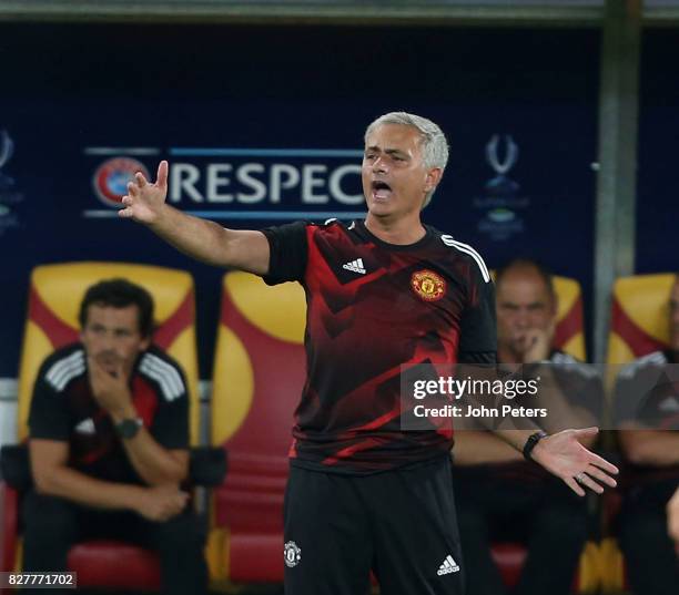 Manager Jose Mourinho of Manchester United watches from the dugout during the UEFA Super Cup match between Real Madrid and Manchester United at...