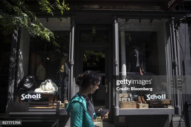 Pedestrian walks past the Schott NYC flagship store in the SoHo neighborhood of New York, U.S., on Thursday, Aug. 3, 2017. The U.S. Census Bureau is...