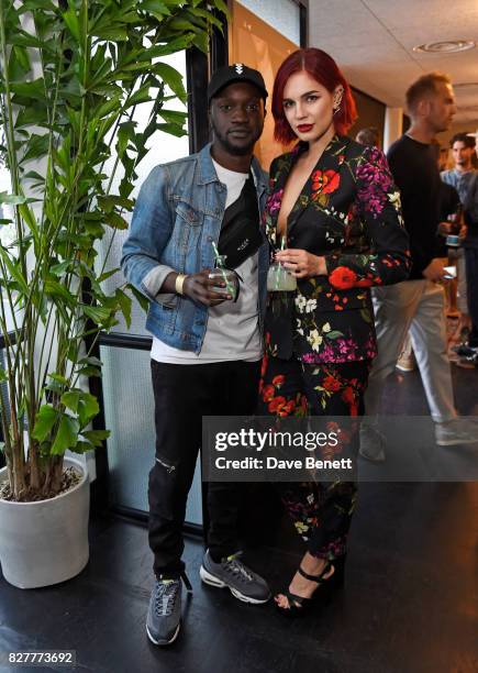 Arnold Oceng and Nikita Andrianova attend the launch of James Bay's new Topman collection at The Ace Hotel on August 8, 2017 in London, England.