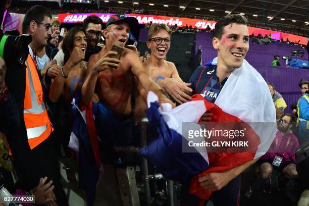 France's Pierre-Ambroise Bosse celebrates after winning the final of the men's 800m athletics event at the 2017 IAAF World Championships at the...