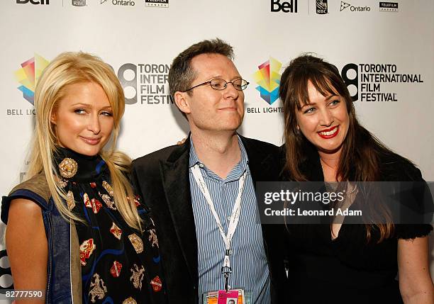 Socialite Paris Hilton, TIFF programmer Thom Powers and director Adria Petty arrive at the "Paris, Not France" film premiere held at Reyerson Theatre...