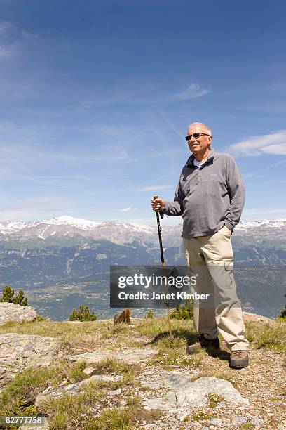 hiking in swiss alps - best sunglasses for bald men fotografías e imágenes de stock